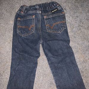 2 separate our of wrangler jeans